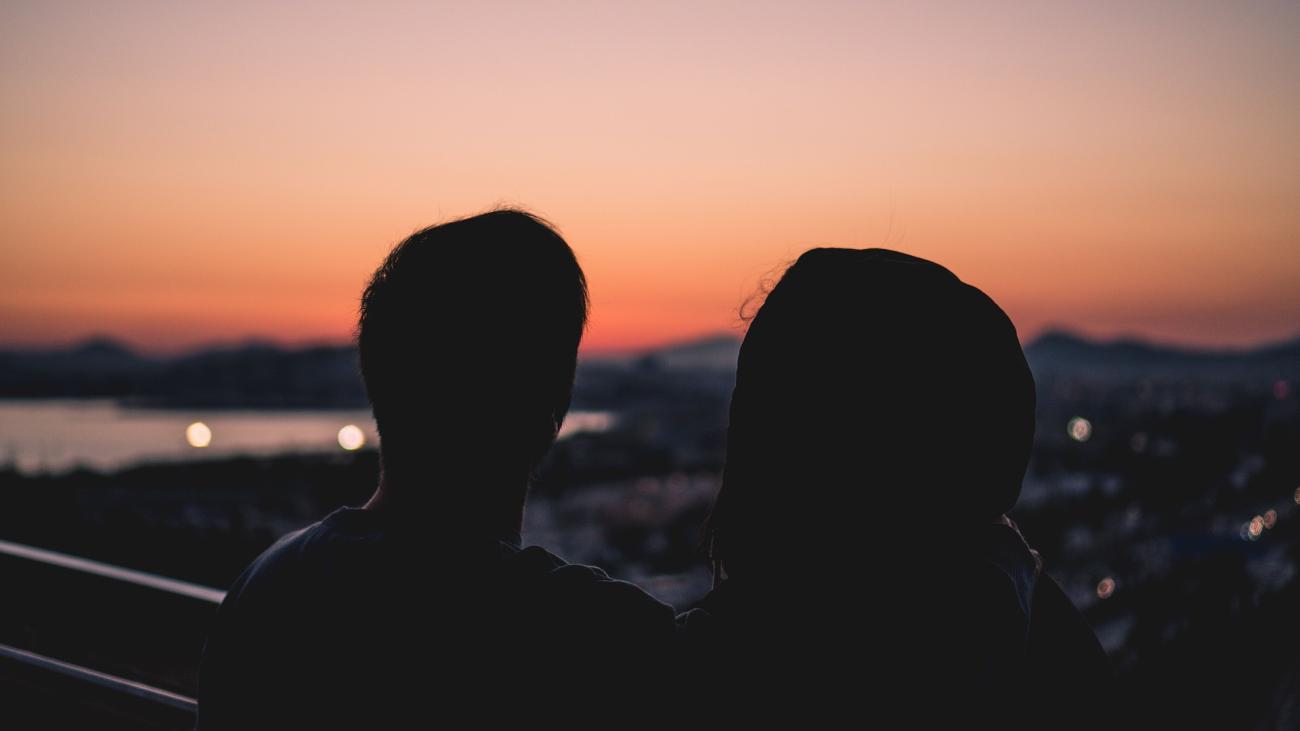 Couple looking over the horizon