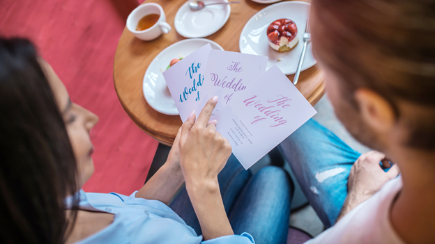 Couple looking at their invitations