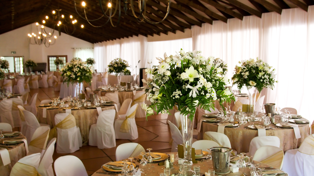 an indoor wedding reception venue with flower décor