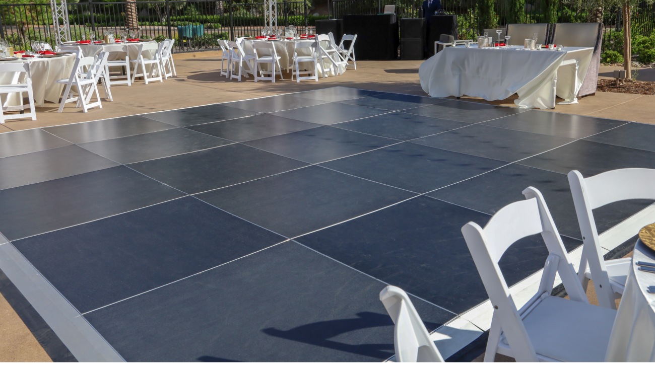 an empty small dance floor at a wedding reception venue