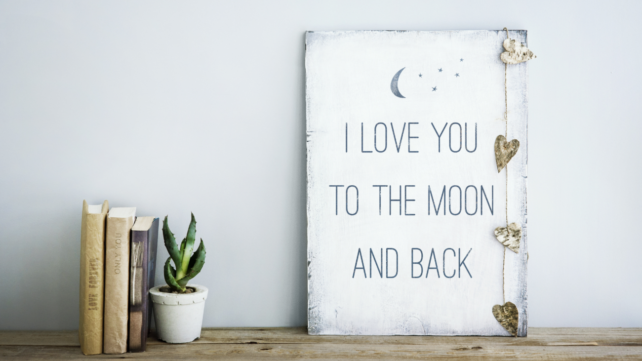 a motivational poster with phrase ‘I love you to the moon and back’