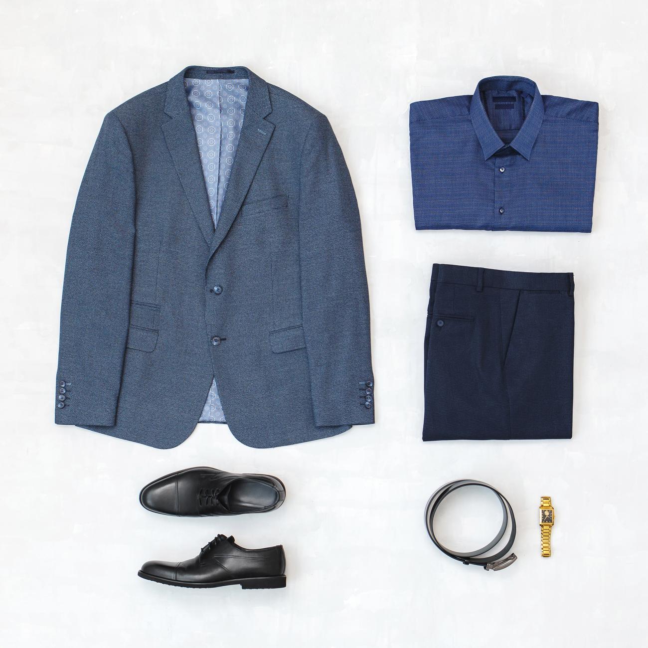 Flatlay with coat jacket, shirt, pants, belt, shoes and watch