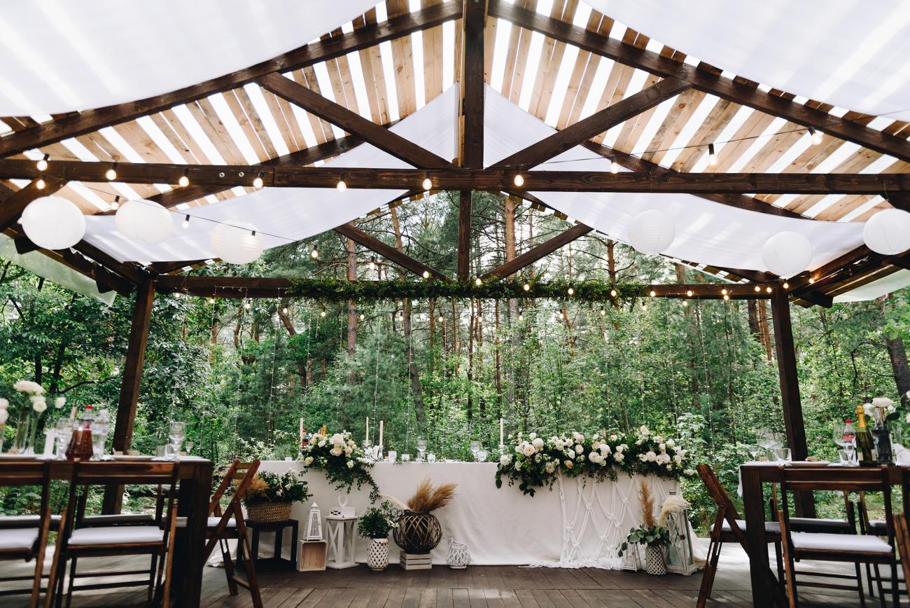 Wedding archway with decorated dinner table underneath