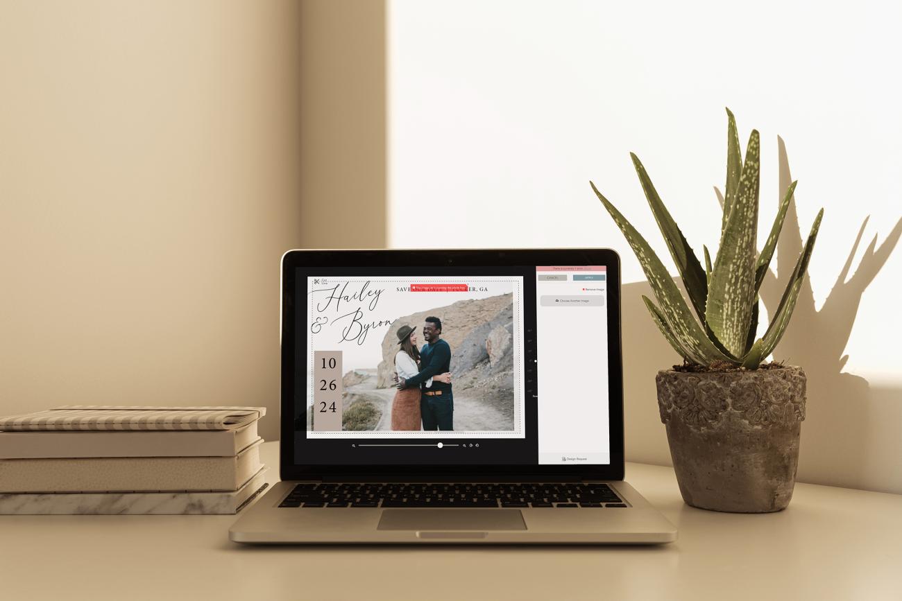 Desk with computer open to Truly Engaging's design studio showing an error