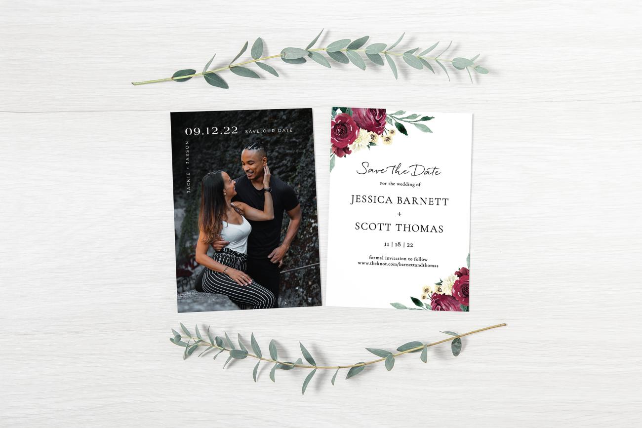 Floral save the date and photo save the date surrounded by greenery