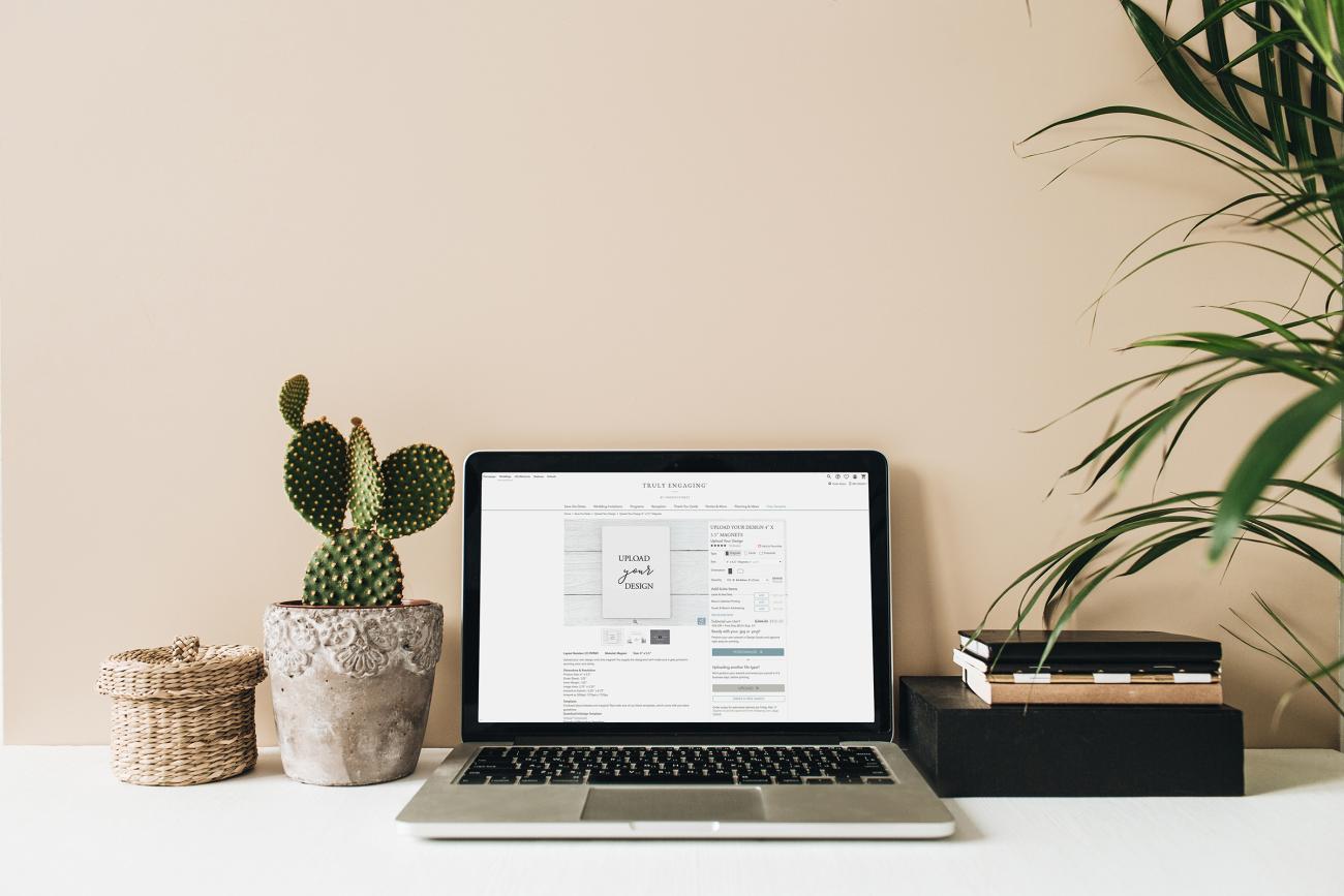 Laptop on desk open to Truly Engaging website