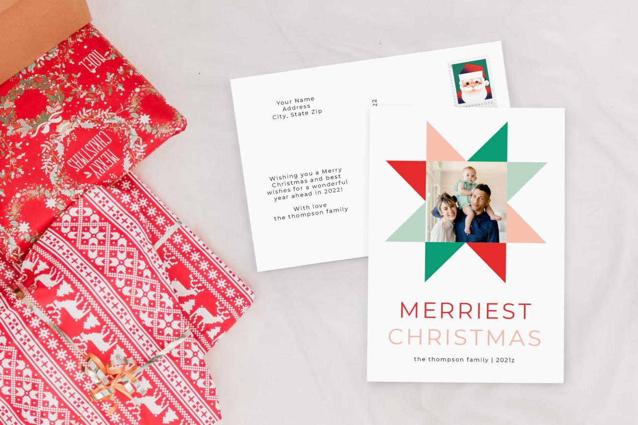 Christmas Postcards next to Christmas presents