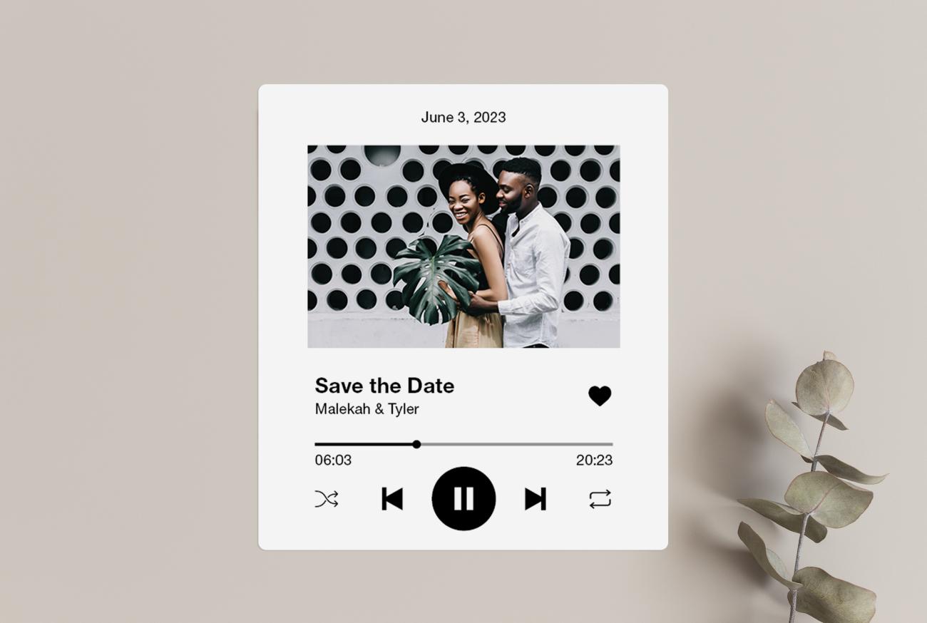Save the Date Magnet next to sprig of eucalyptus