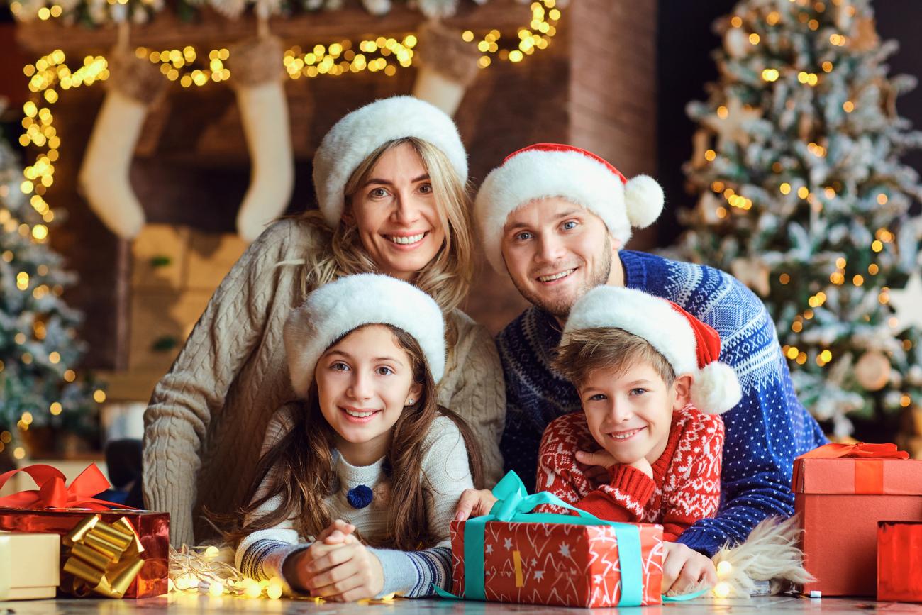 Christmas Card Picture of family in front of a fireplace