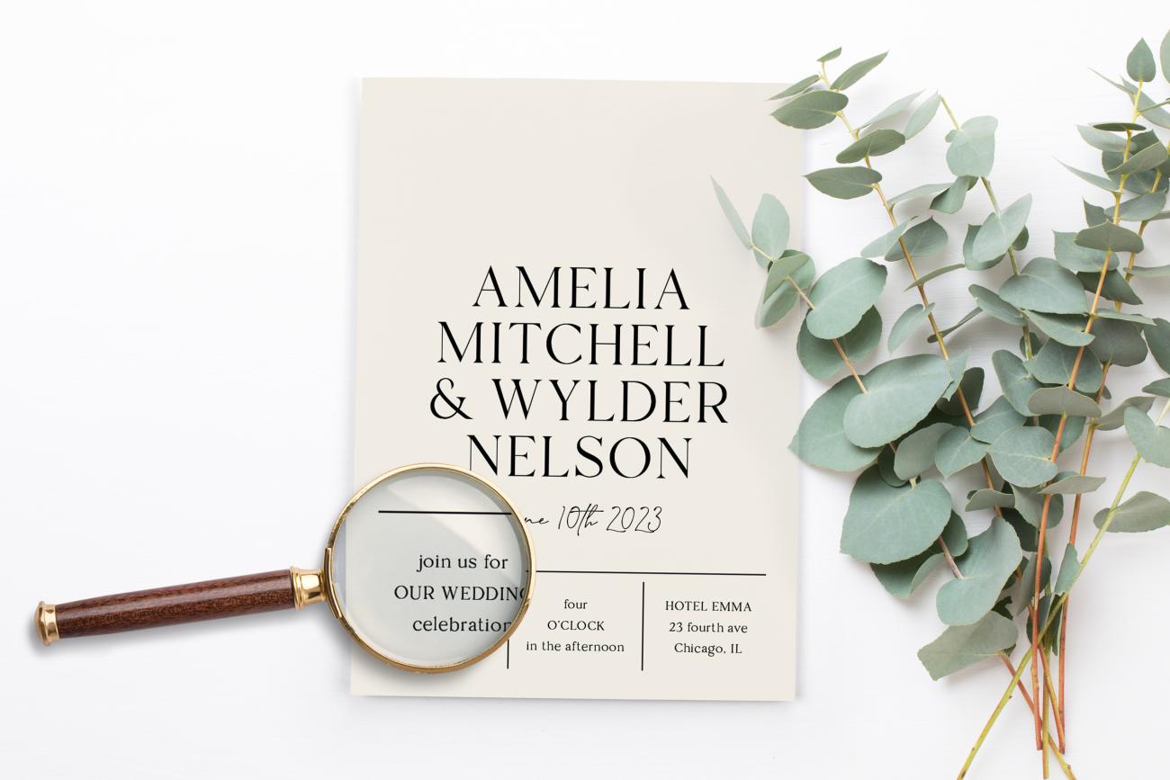Using magnifying glass to proofread Wedding Invitations