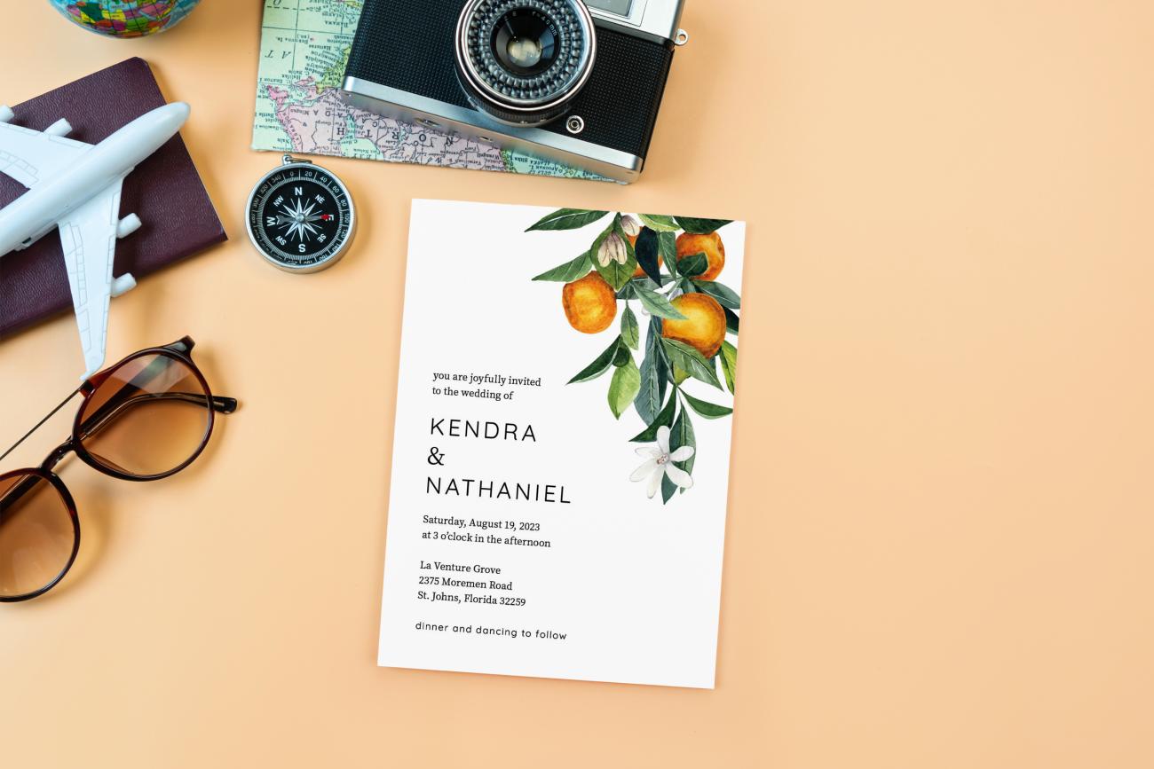 Destination Wedding Invitation with camera, map, sunglasses