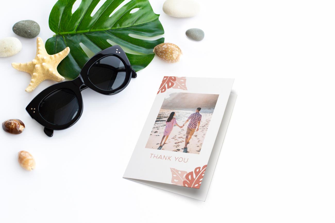 Thank You with sunglasses and shells