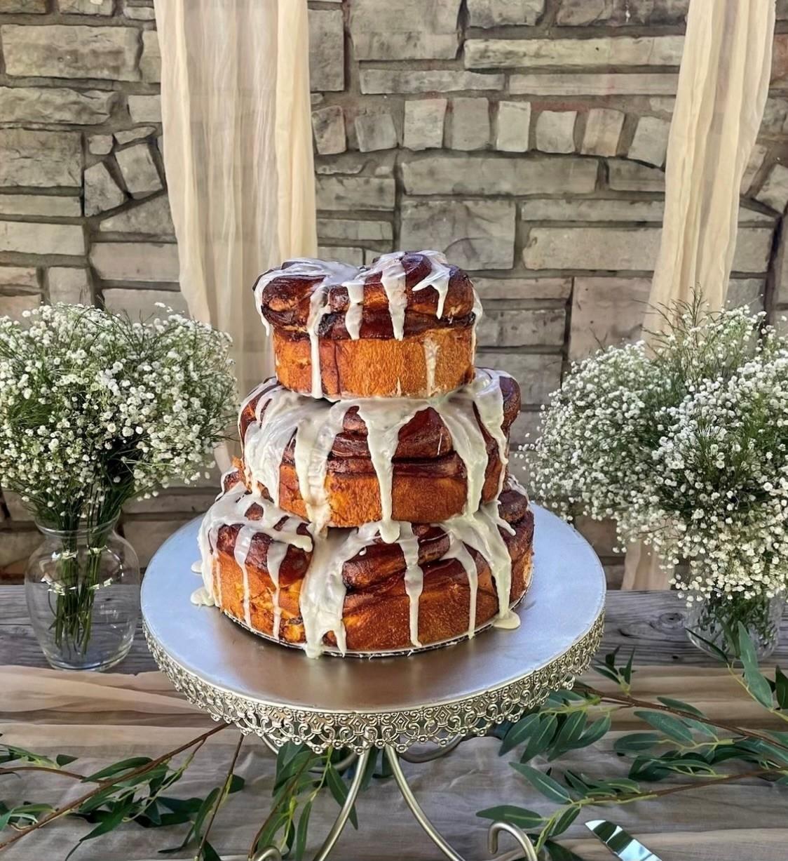 Cinnamon Roll with dripping icing as a Wedding Cake