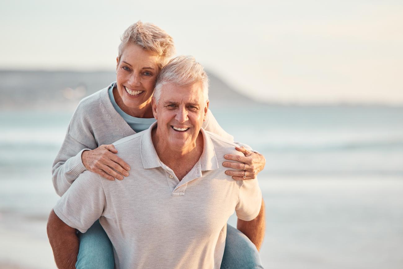 Anniversary Photo - piggyback on the beach