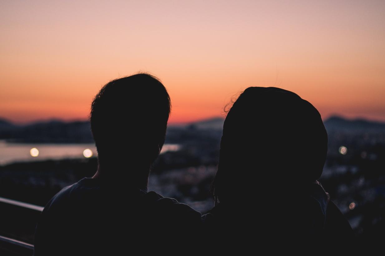 Couple looking over the horizon