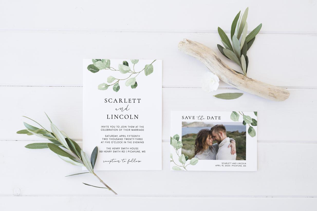 Matching wedding invitation and save the date card surrounded by sprigs