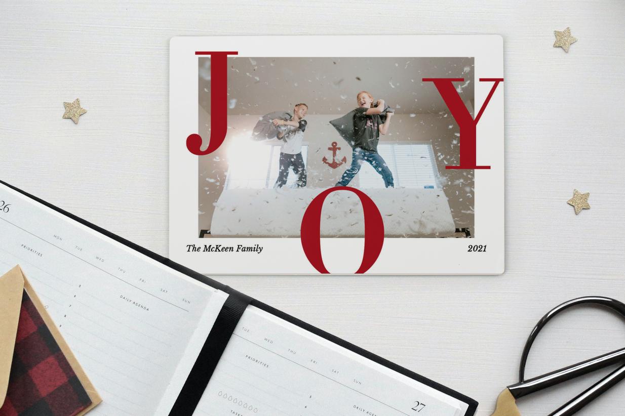 Magnetic Christmas Card on a desk with a planner