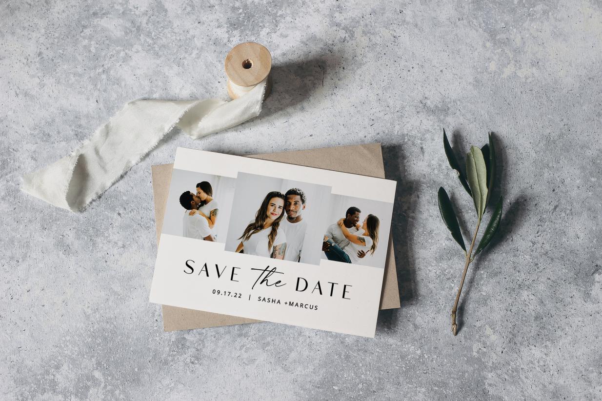 Save the date card on circular tray next to leaves