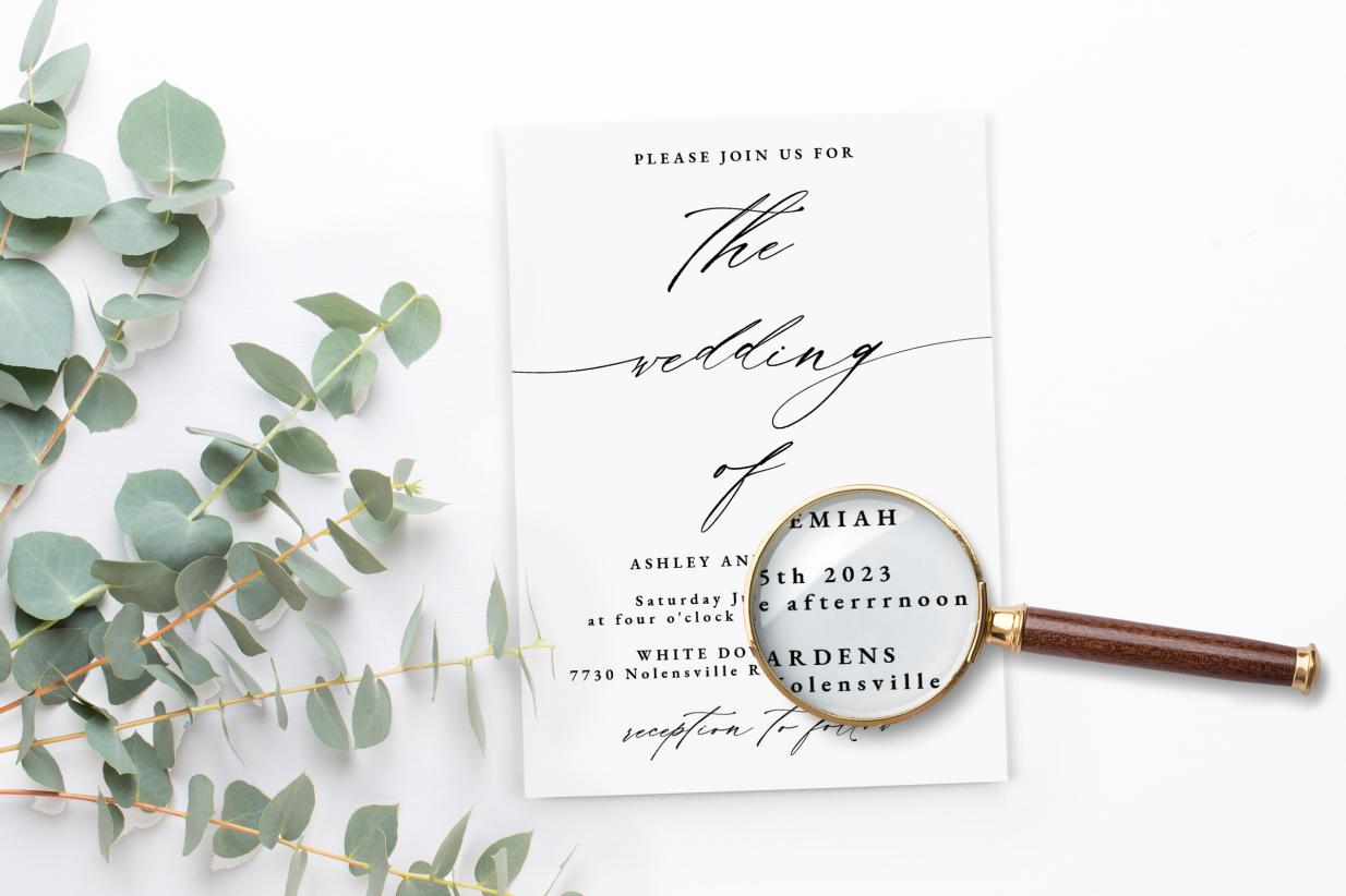 Proofreading Wedding Invitation with magnifying glass