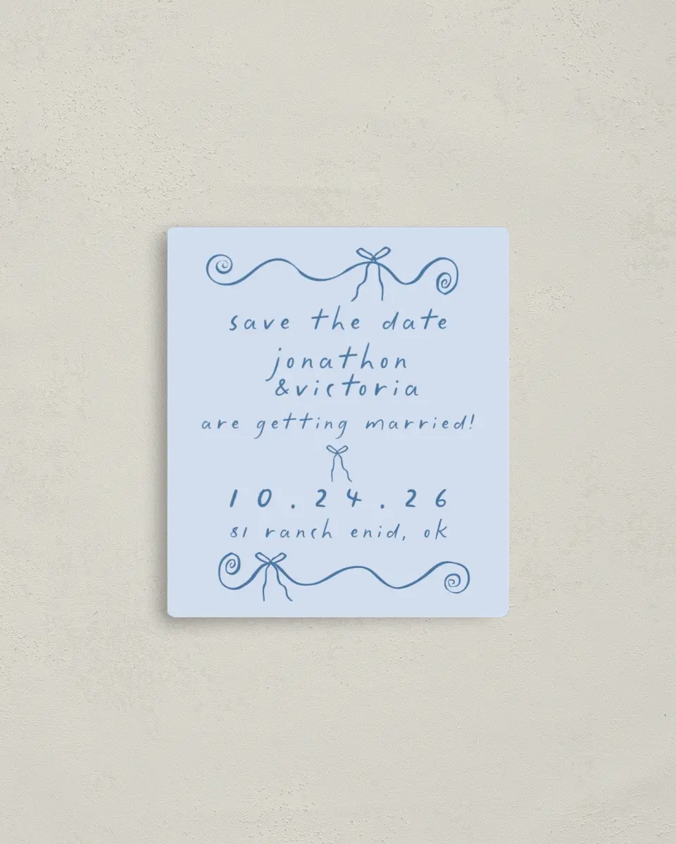 This is a 3½" x 4" Save the Date Magnet called Ribbon Kisses printed in full color with a Luxe Satin finish