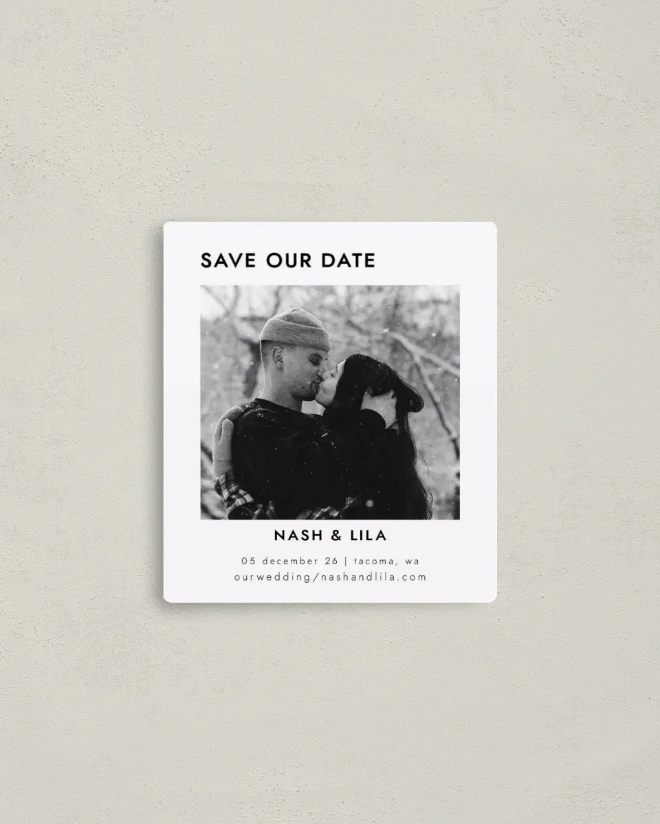 This is a 3½" x 4" Save the Date Magnet called Snowy Kisses printed in full color with Gold foil and a Luxe Satin finish