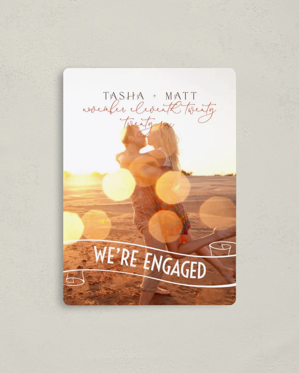 This is a 4" x 5½" Save the Date Magnet called A Charmed Engagement printed in full color with a Luxe Satin finish