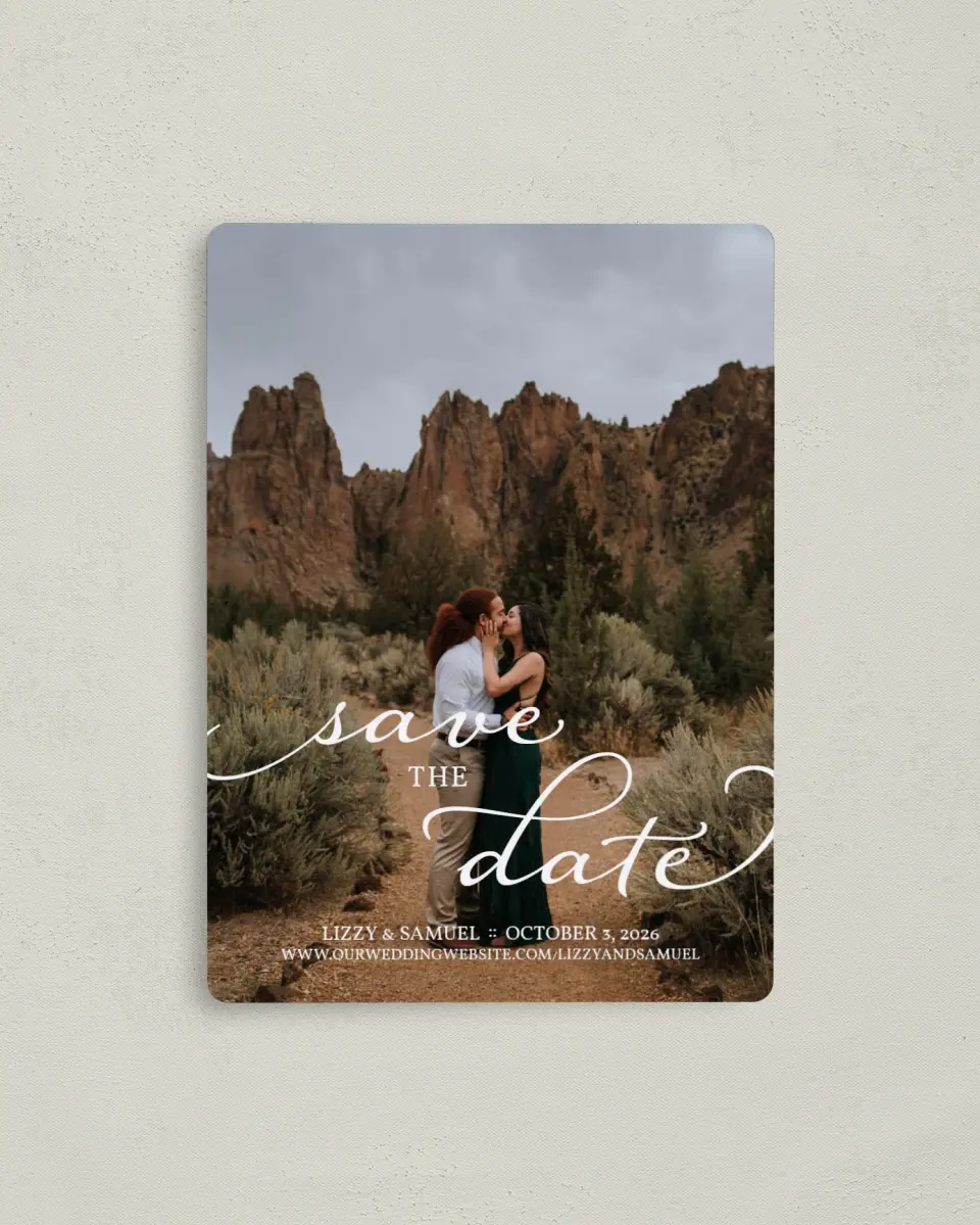 This is a 4" x 5½" Save the Date Magnet called Scripted Embrace printed in full color with a Luxe Satin finish