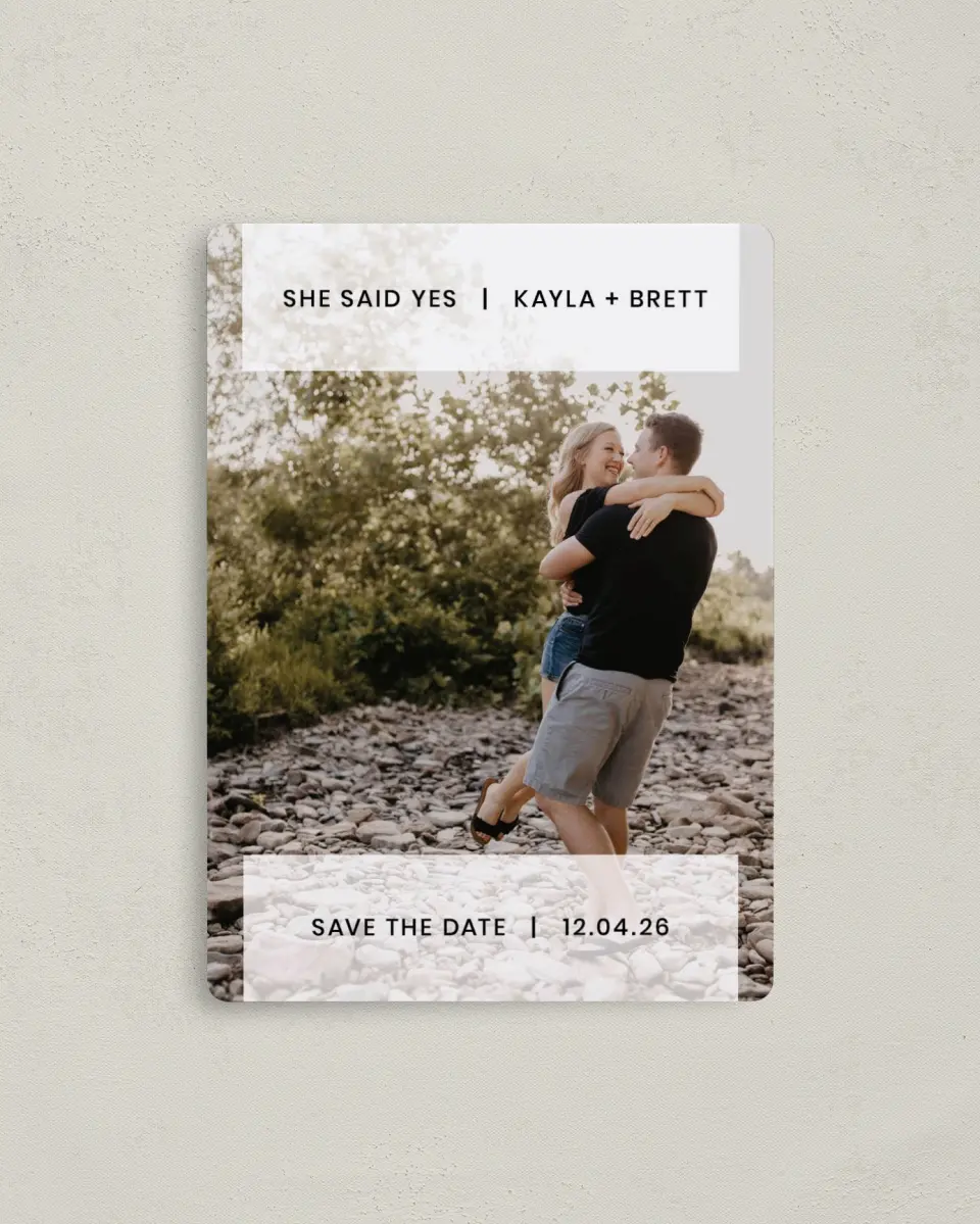 This is a 4" x 5½" Save the Date Magnet called Carried Away printed in full color with Rose Gold foil and a Luxe Satin finish