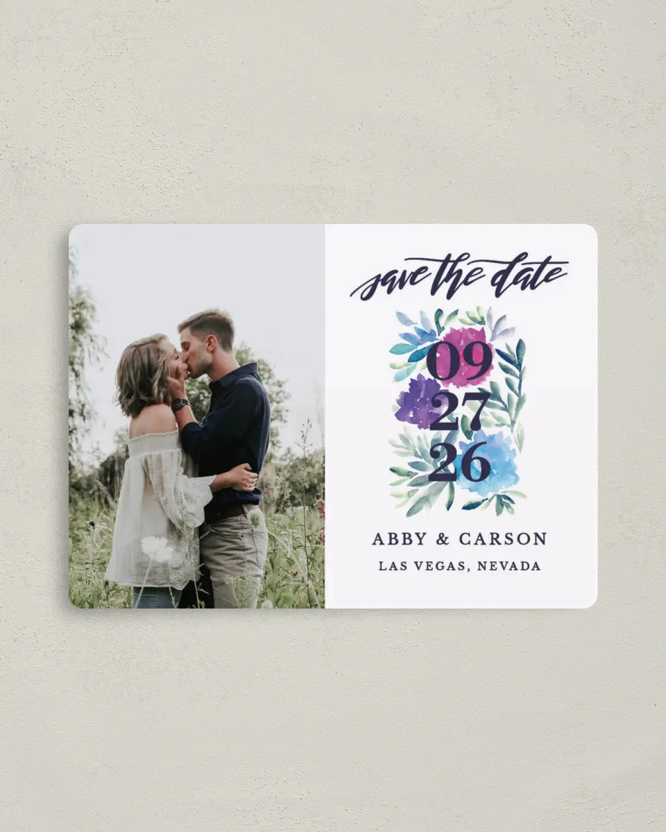 This is a 4" x 5½" Save the Date Magnet called Kissing Charm printed in full color with a Luxe Satin finish