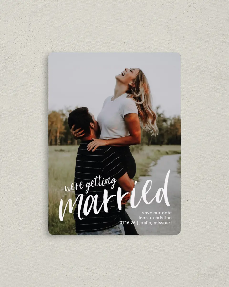 This is a 4" x 5½" Save the Date Magnet called Exciting News printed in full color with a Luxe Satin finish
