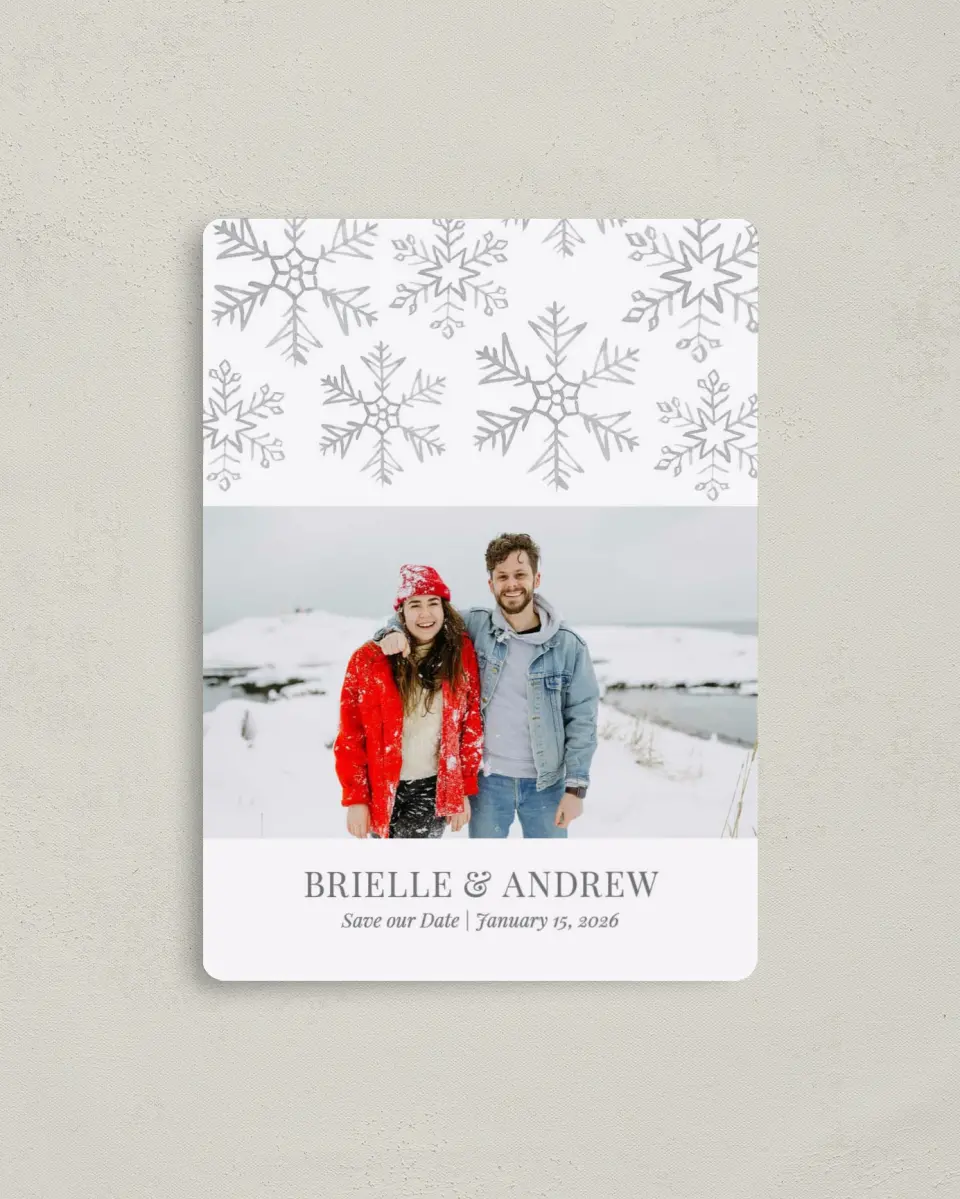 This is a 4" x 5½" Save the Date Magnet called Sweet Snowflakes printed in full color with a Luxe Satin finish