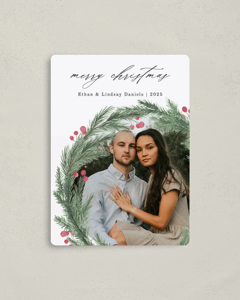 This is a 4" x 5½" Christmas Card called Asymmetrical Wreath printed in full color with Silver foil and a Luxe Satin finish