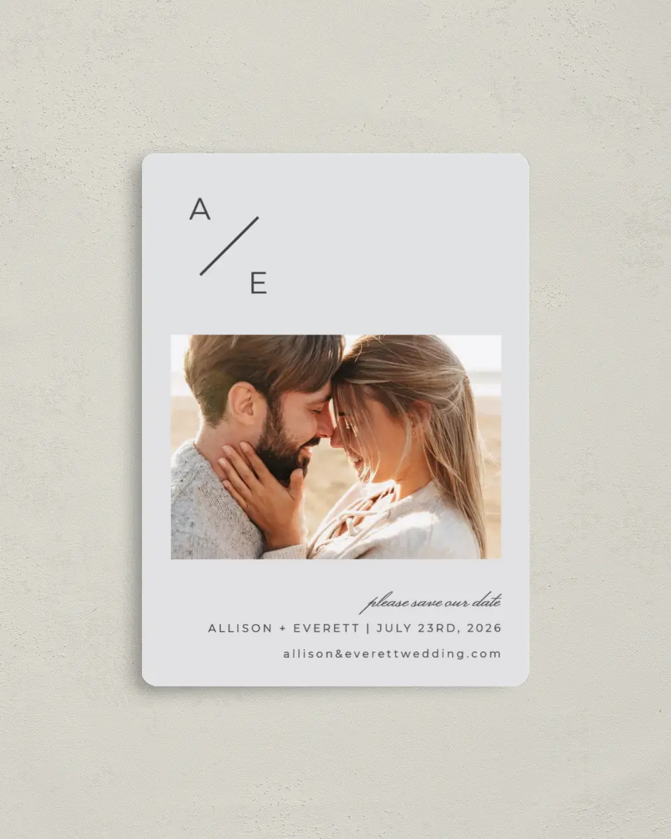This is a 4" x 5½" Save the Date Magnet called Initial Hush printed in full color with a Luxe Satin finish