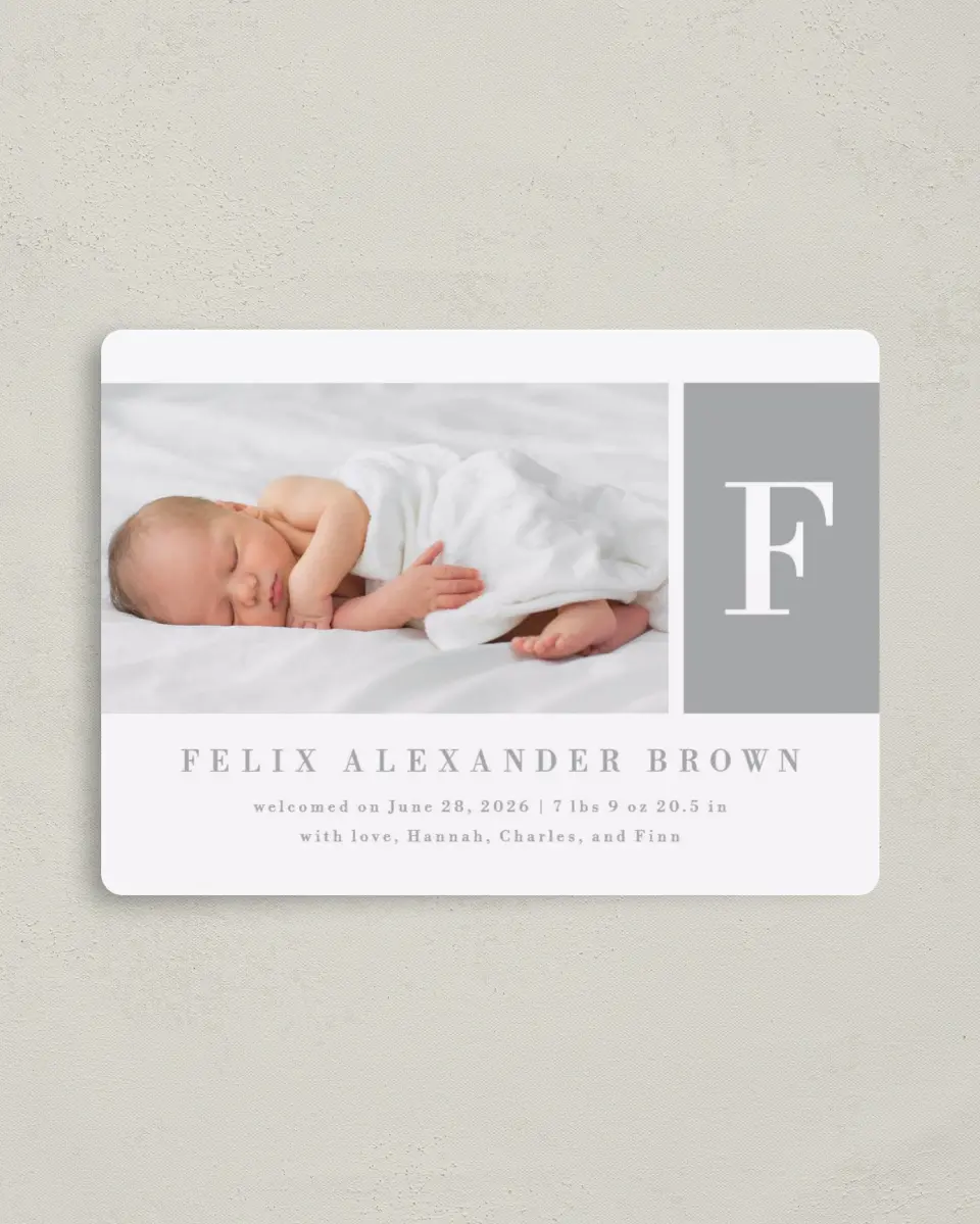 This is a 4" x 5½" Birth Announcement Magnet called Minimal Monogram printed in full color with Rose Gold foil and a Luxe Satin finish