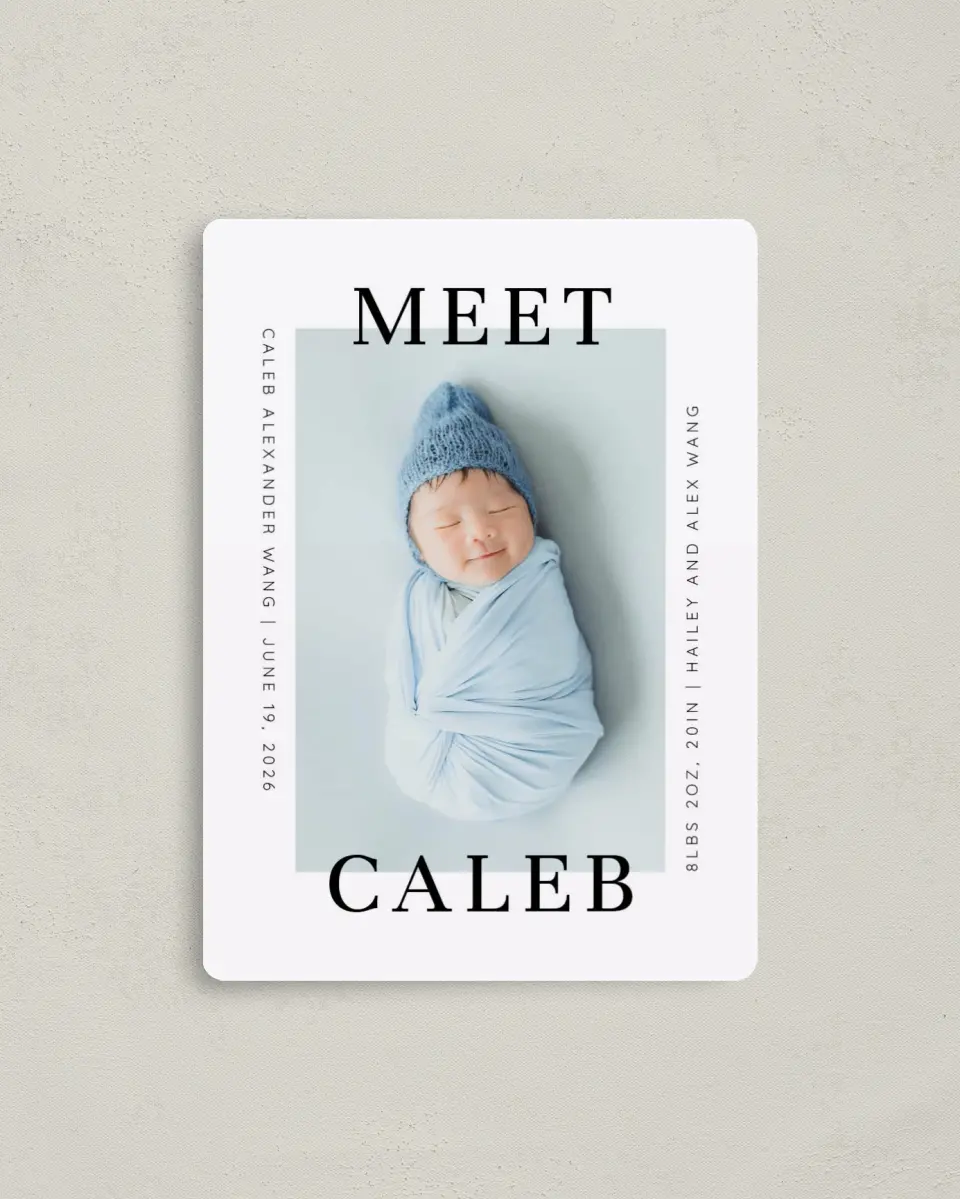 This is a 4" x 5½" Birth Announcement Magnet called Modern Meeting printed in full color with Silver foil and a Luxe Satin finish