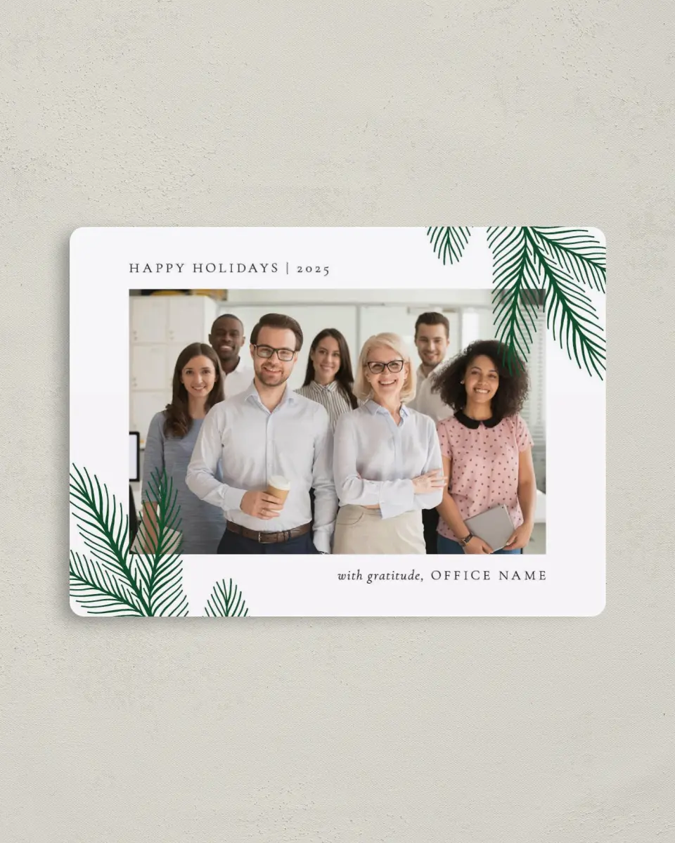 This is a 4" x 5½" Christmas Card called Corner Sprigs printed in full color with Rose Gold foil and a Luxe Satin finish