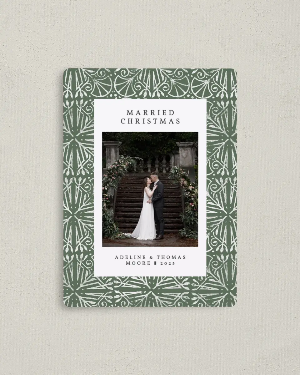 This is a 4" x 5½" Christmas Card called Married Motif printed in full color with Rose Gold foil and a Luxe Satin finish