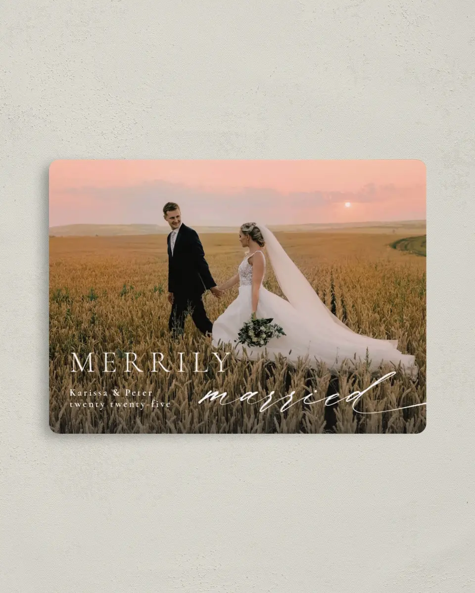 This is a 4" x 5½" Christmas Card called Married Script printed in full color with Rose Gold foil and a Luxe Satin finish