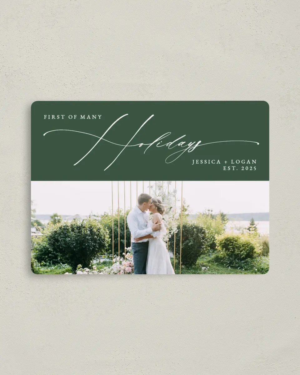 This is a 4" x 5½" Christmas Card called Scripted Holidays printed in full color with Rose Gold foil and a Luxe Satin finish
