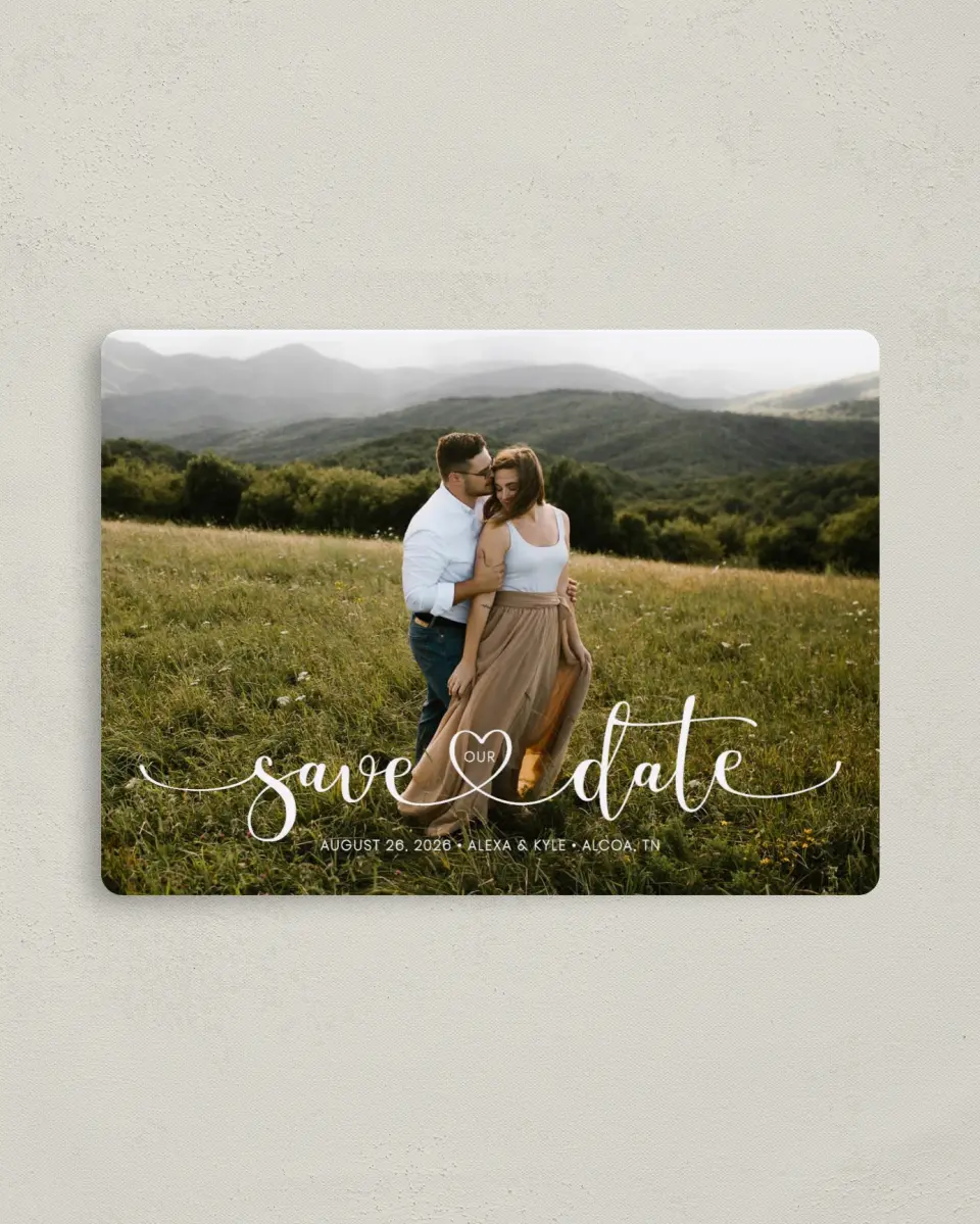 This is a 4" x 5½" Save the Date Magnet called Entwined Heart printed in full color with Rose Gold foil and a Luxe Satin finish