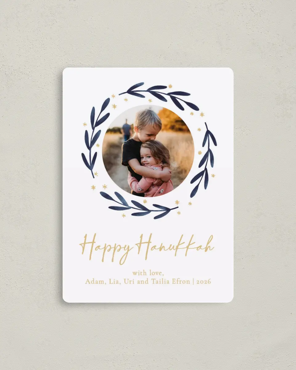 This is a 4" x 5½" Hanukkah Card called Peaceful Wreath printed in full color with Silver foil and a Luxe Satin finish