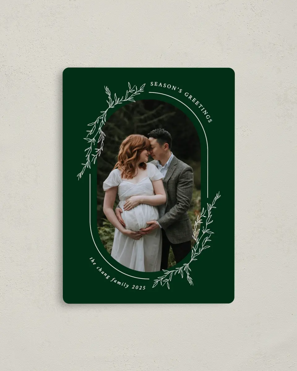 This is a 4" x 5½" Christmas Card called Evergreen Greetings printed in full color with Rose Gold foil and a Luxe Satin finish