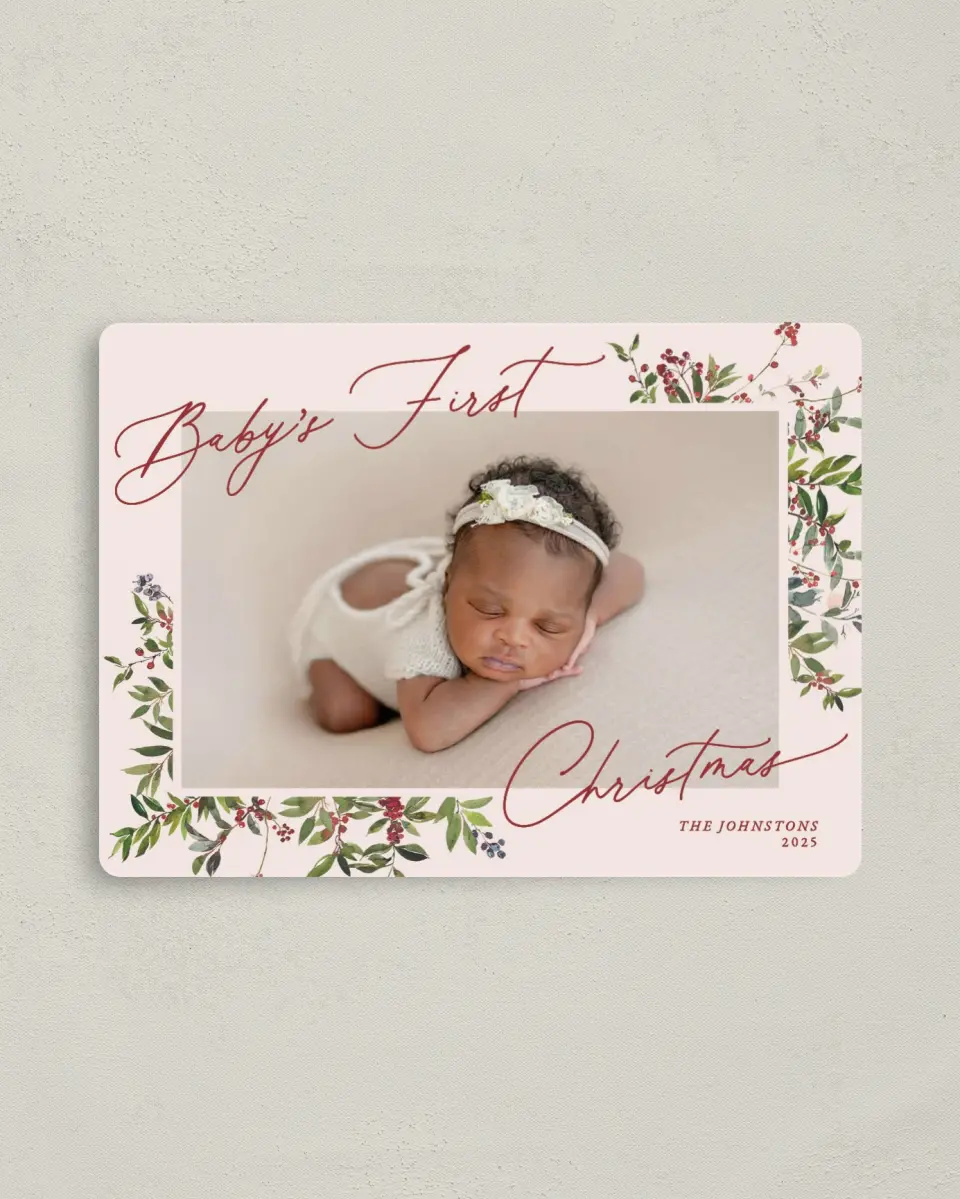 This is a 4" x 5½" Christmas Card called Baby's 1st Christmas printed in full color with Rose Gold foil and a Luxe Satin finish