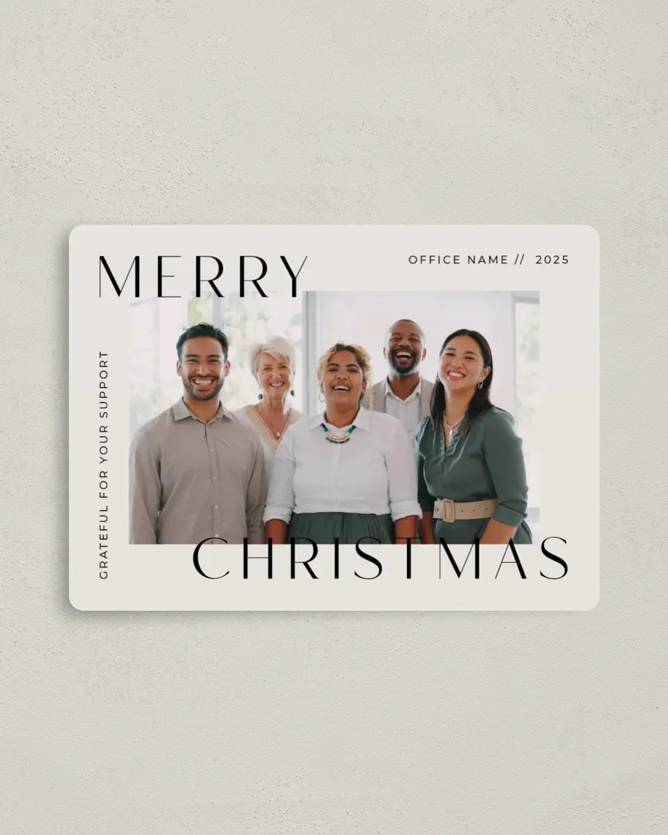 This is a 4" x 5½" Christmas Card called Office Christmas printed in full color with Rose Gold foil and a Luxe Satin finish