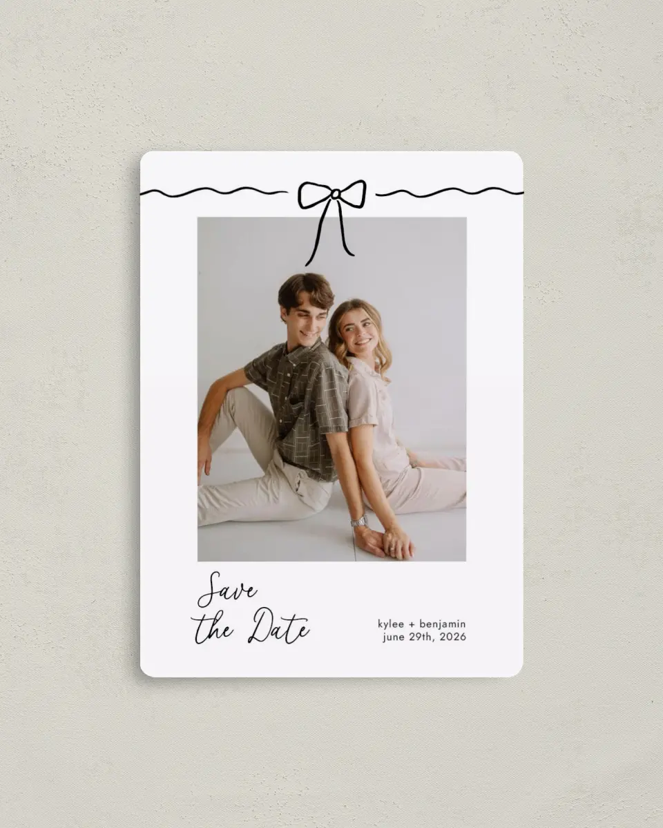 This is a 4" x 5½" Save the Date Magnet called Bows and Bliss printed in full color with a Luxe Satin finish