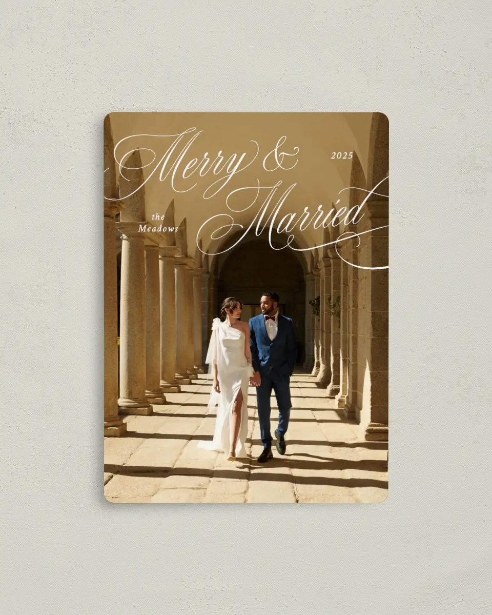 This is a 4" x 5½" Christmas Card called Elegant Newlyweds printed in full color with Rose Gold foil and a Luxe Satin finish