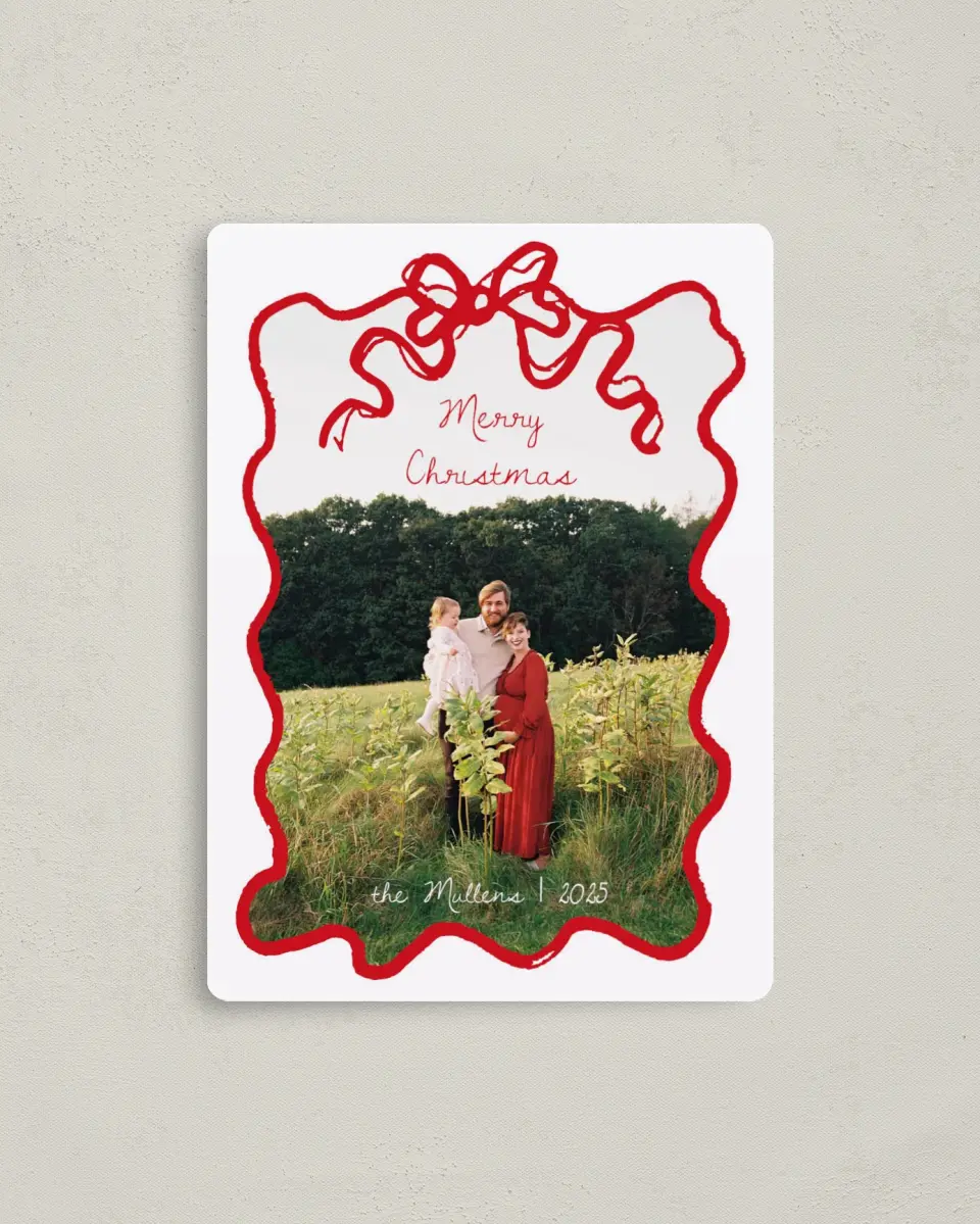 This is a 4" x 5½" Christmas Card called Tied Together printed in full color with Gold foil and a Luxe Satin finish