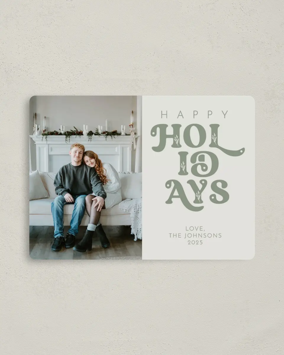 This is a 4" x 5½" Christmas Card called Festive Flourish printed in full color with Silver foil and a Luxe Satin finish