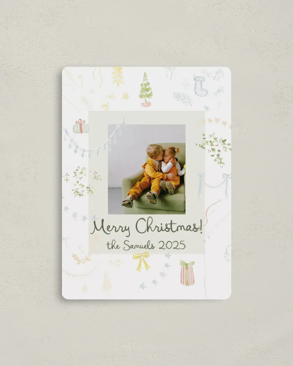 This is a 4" x 5½" Christmas Card called Christmas Kisses printed in full color with Silver foil and a Luxe Satin finish
