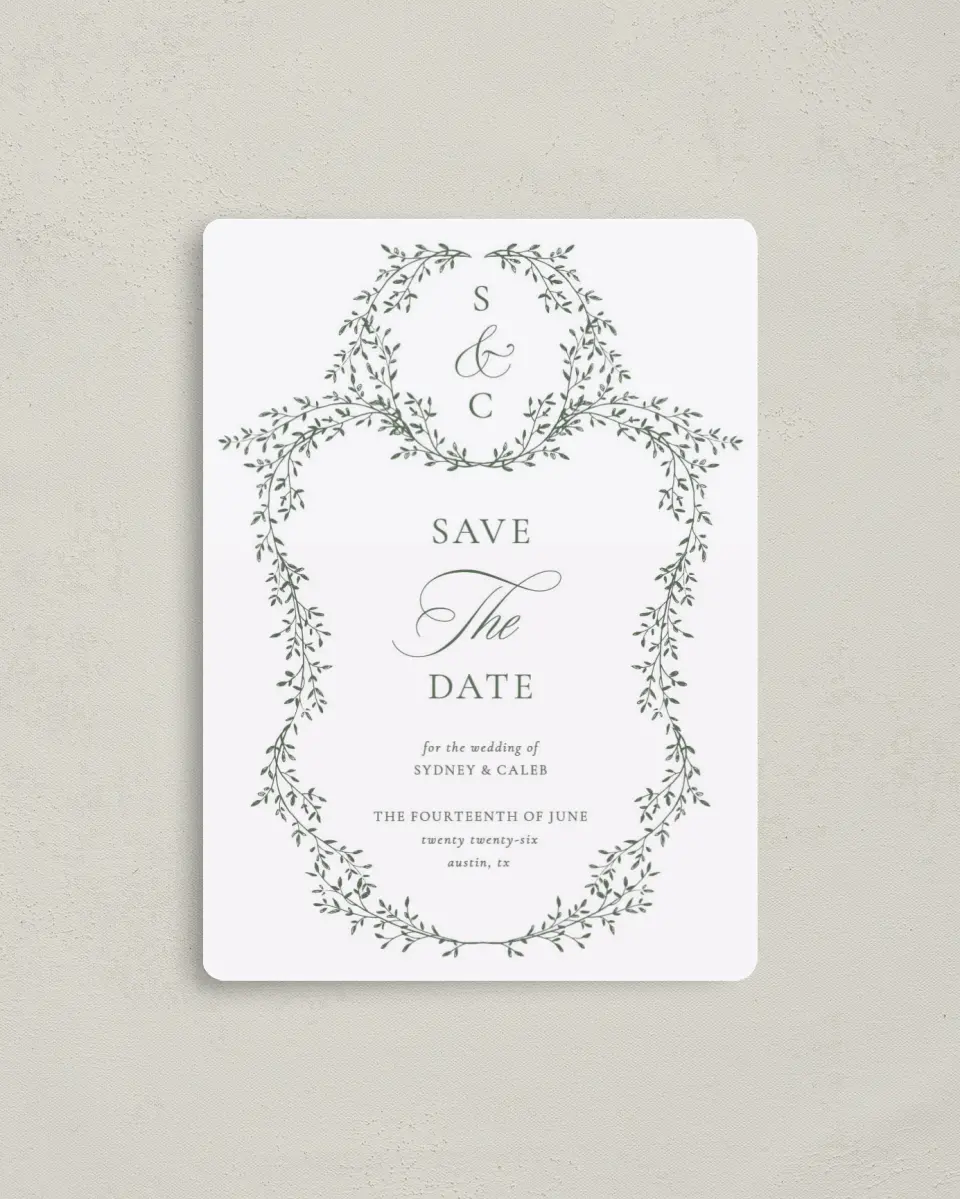 This is a 4" x 5½" Save the Date Magnet called Elegant Frame printed in full color with a Luxe Satin finish